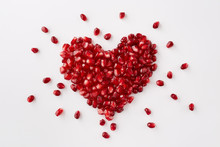 Pomegranate Seeds In A Shape Of A Heart