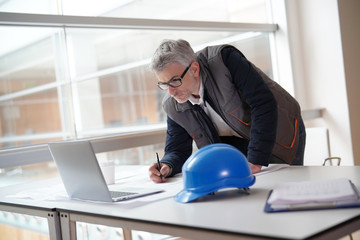 Wall Mural - Architect in office working on building project