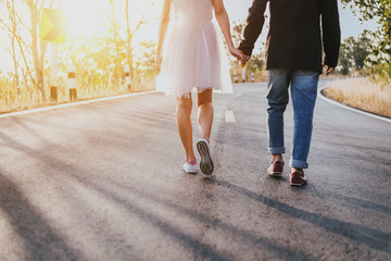 Wall Mural - Asian couple love walking on street, Unrecognizable faces.