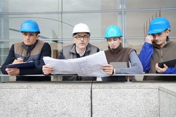 Instructor with young people in engineering training