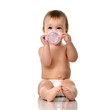 © Dmitry Lobanov - Beautiful infant baby girl toddler sitting in diaper with bottle of water