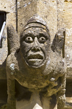 Grotesque Gargoyles On The Historic Cotswold Church At Winchcombe, Gloucestershire, UK.