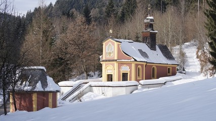 Maria Larch, Terfens, Eggen near Schwaz, Tyrol, Austria - pilgrimage church in winter 2018 with snow