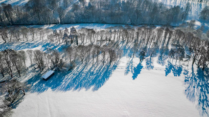 Poster - Drone view of a golf course covered by snow