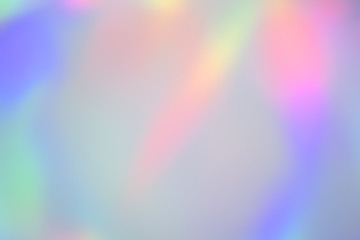 Blurry abstract pastel holographic foil background