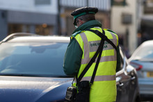 Traffic Warden Or Civil Enforcement Officer Issuing Parking Ticket Fine In UK