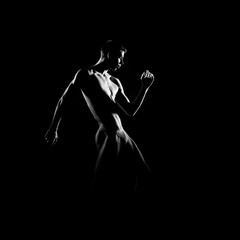 Wall Mural - Black and white silhouette of male ballet dancer.