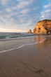 beautiful sandy beach on atlantic coastline in sunset glow, hendaye, basque country, france