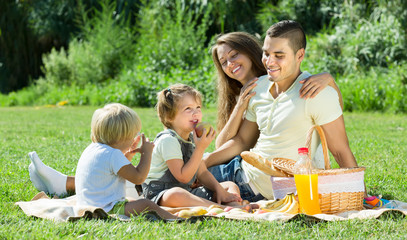 Wall Mural - Family of four on picnic