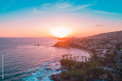 Fotografie, Obraz Aerial view over Crescent Bay in Laguna Beach at sunset overlooking Orange County beaches