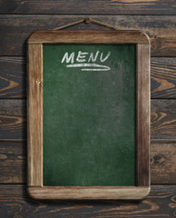 Wall Mural - menu blackboard hanging on wooden wall 3d illustration