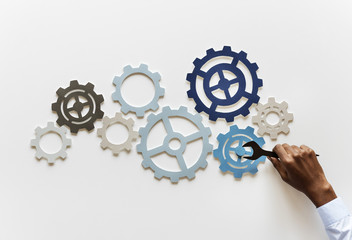 Hand with support gears isolated on white background