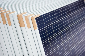 Alternative electricity source. Stack of photovoltaic solar panels. Renewable energy production modules blue modern sustainable resources ecological power plant