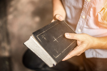 A man reading the Holy Bible.