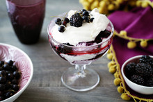 Blackberry Fool With Cream In Dessert Glass, Close-up