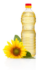 Bottle of sunflower oil with flower isolated on white background