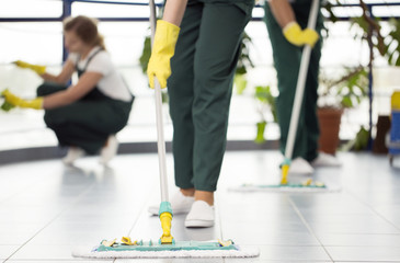 Wall Mural - Person cleaning the floor