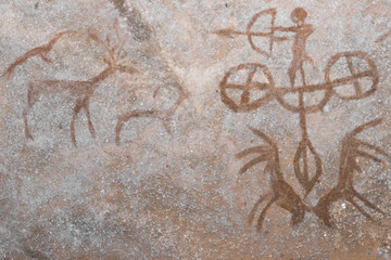 Wall Mural - A hunting scene on the wall of the cave. ancient hunters. archeology. era. stone Age.