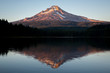 © Mat Rick Photography - A view of a mountain over a lake at sunset