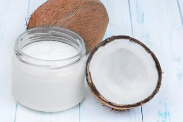 Poster - Fresh coconut oil in glassware on table