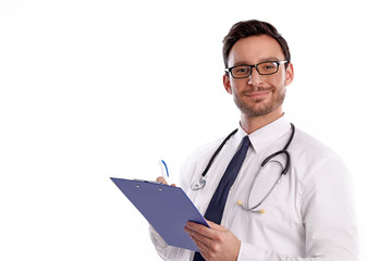 Wall Mural - smart handsome bearded medical doctor in glasses with Stethoscope isolated on white background. Man from hospital with a Clipboard is ready to write something down
