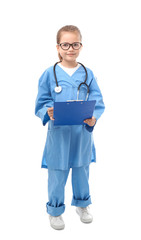 Cute little girl in doctor uniform with clipboard on white background