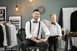 © Africa Studio - Father and son in elegant suits, indoors