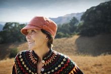 Smiling Caucasian Woman Wearing Hat Outdoors