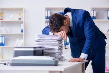 Wall Mural - Businessman making copies in copying machine