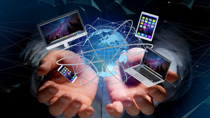 Wall Mural - Businessman holding a Computer and devices displayed on a futuristic interface with international network  - 3d render