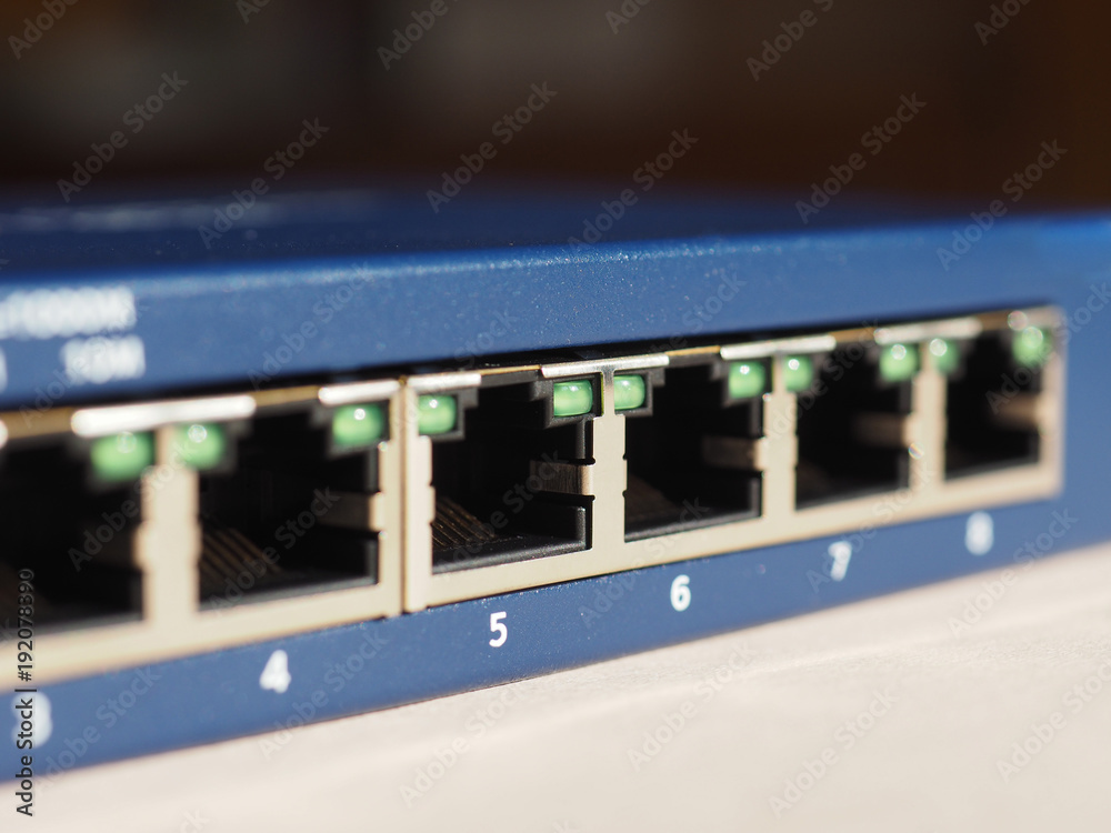 Modem router switch with RJ45 ethernet plug ports Stock Photo | Adobe Stock