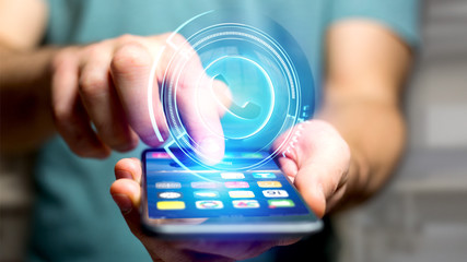 Poster - Businessman using a Shinny technologic phone button on his smartphone - 3d render