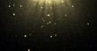Abstract gold glitter particles background with shining stars falling down and light flare or glare overlay effect above for luxury premium product design template backdrop. Magic light radiance