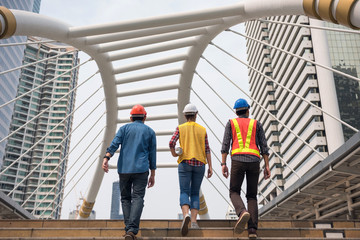 Wall Mural - Engineer team walk together