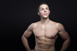 © Teodor Lazarev - Portrait of a shirtless athletic guy, black background