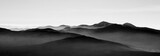 Mountain landscape in sutton, black and white with mist on background
