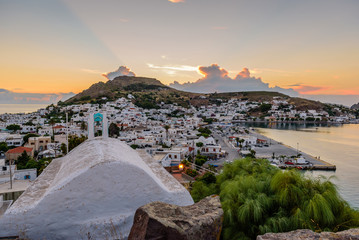 Wall Mural - Beautiful sunset view of Skala village in Patmos island, Dodecanese, Greece