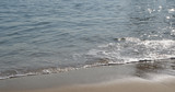 Fototapeta Morze - Sandy beach and rock