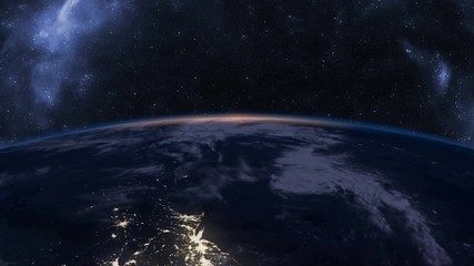 slow sunrise over earth seen from space, time-lapse, 4k