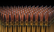 © Guy Sagi - Large amount of rifle bullets on a black background