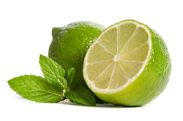  one lime with half of a juicy lime with leaves of mint isolated on white background