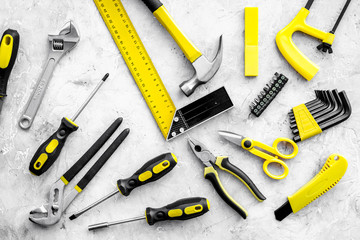 Various repair tools. Must-have for men. Equipment for building. Repair tool kit. Grey background top view pattern