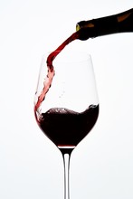 Red Wine Pouring Into Wine Glass