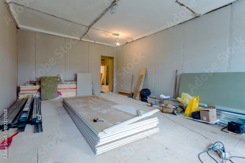 Working Process Of Installing Metal Frames For Plasterboard Drywall For Gypsum Walls And Tools In Apartment Is Under Construction Remodeling Renovation Extension Restoration And Reconstruction Buy This Stock Photo And Explore