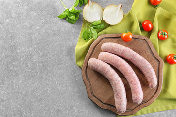 Sticker - Delicious sausages on wooden board