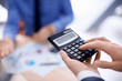 © Africa Studio - Man working in office, closeup. Financial trading concept
