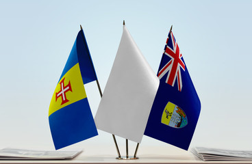 Flags of Madeira and Saint Helena with a white flag in the middle