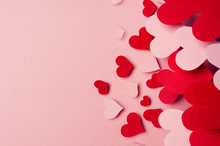 Valentine Day Background Of Fly Paper Red And Pink Hearts On Pink Color Backdrop. Copy Space.