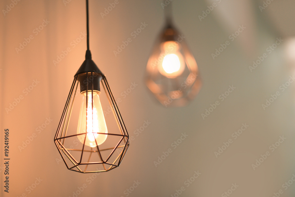 Elegant lamp on blurred background