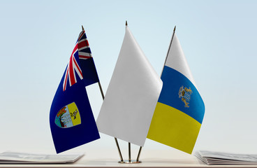 Flags of Saint Helena and Canary Islands with a white flag in the middle